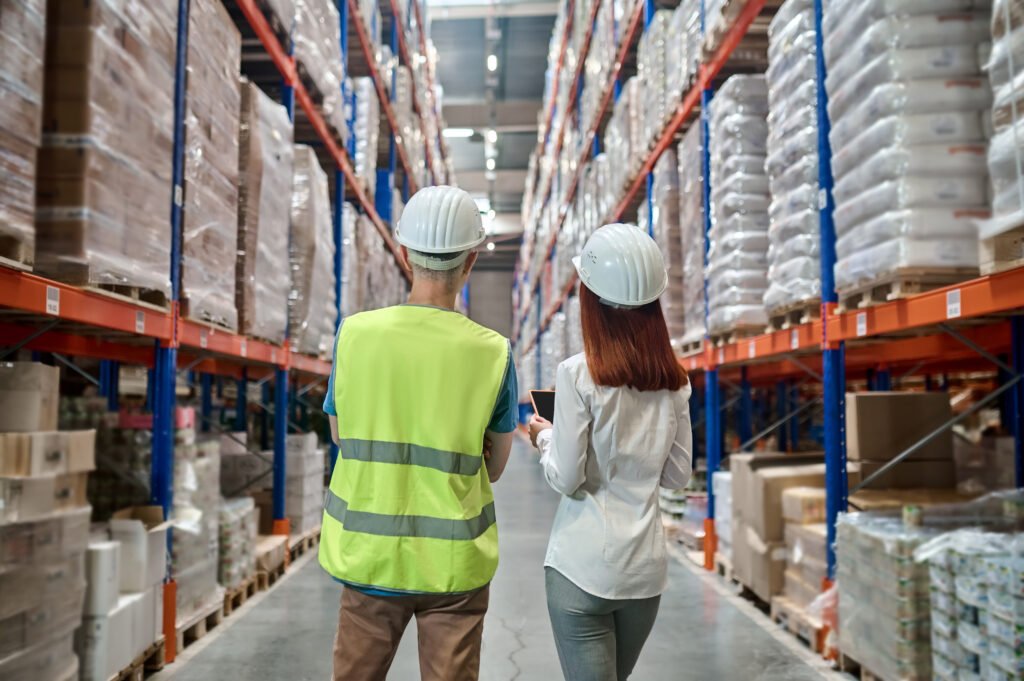 In this image, two people are examining the Flexible packaging.